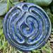 Blue Suede:
Royal blue ceramic finger labyrinth with metallic sparks, handmade for mindfulness and stress reduction. Exterior photo. 